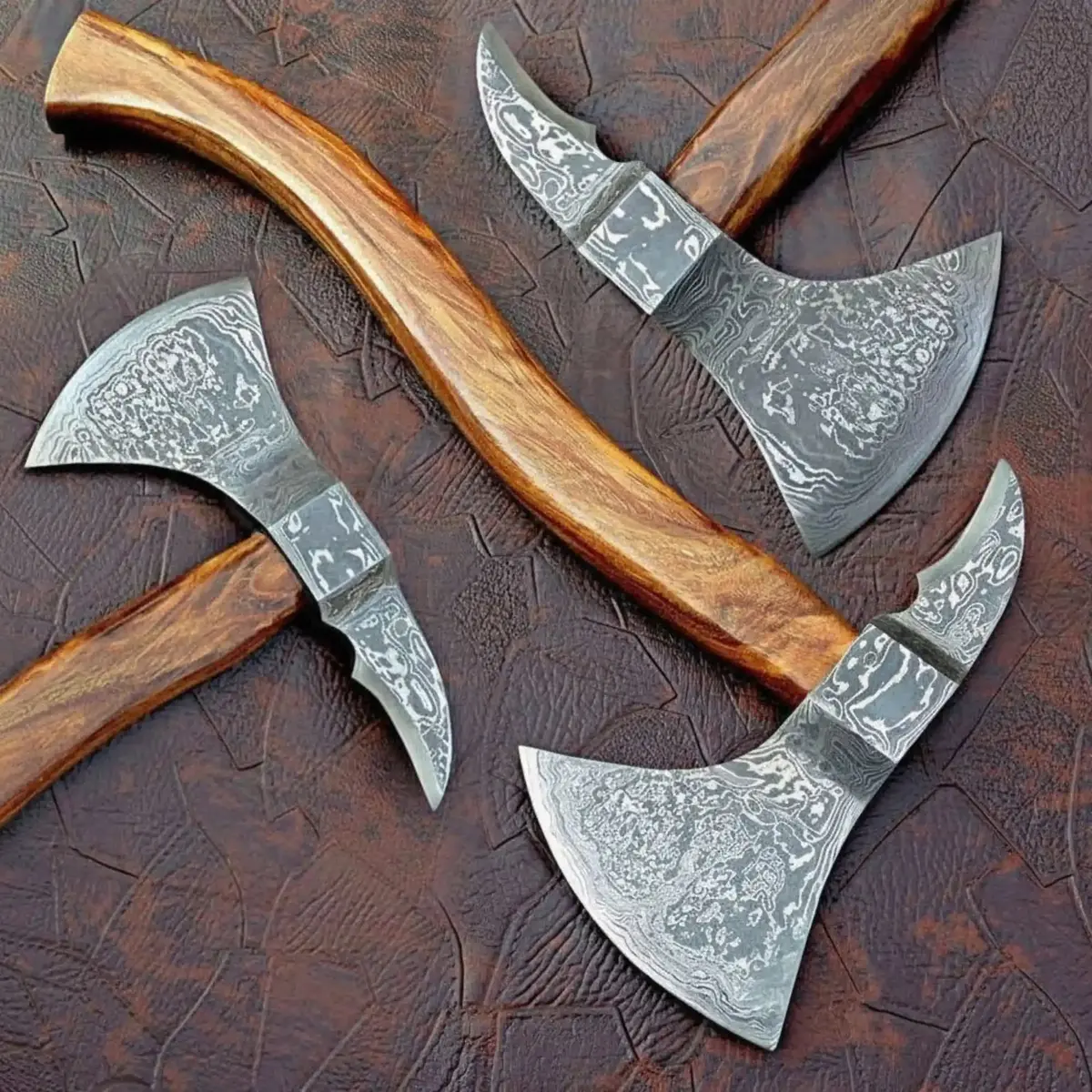 Traditional Norse Axe Featuring Damascus Heads And Sculpted Hardwood Shafts 1